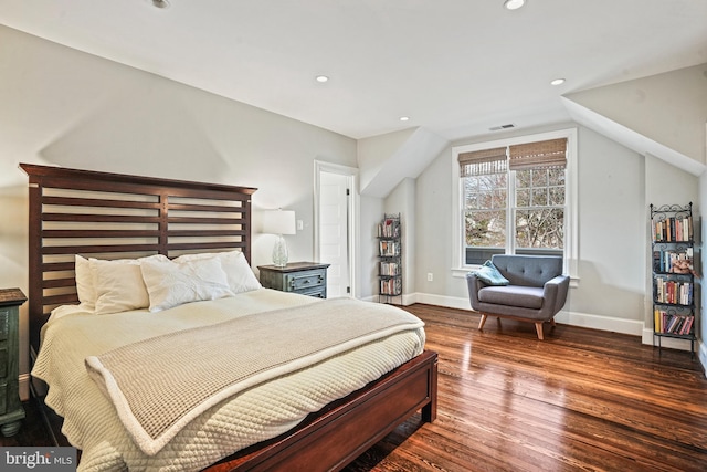 bedroom with recessed lighting, baseboards, wood finished floors, and vaulted ceiling