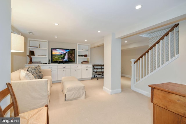 living room with stairway, recessed lighting, baseboards, and light carpet