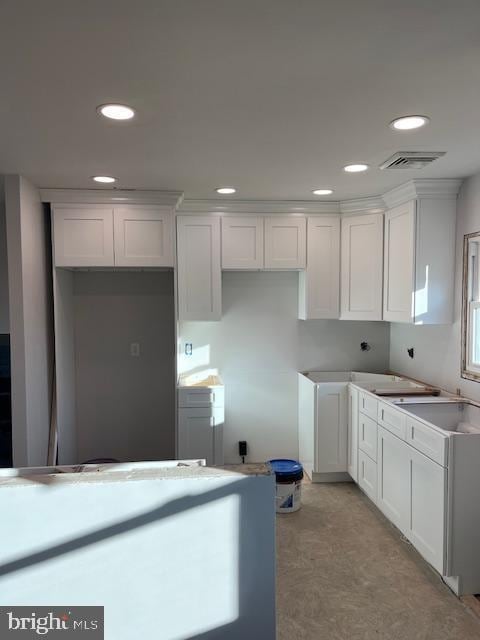 kitchen with white cabinets