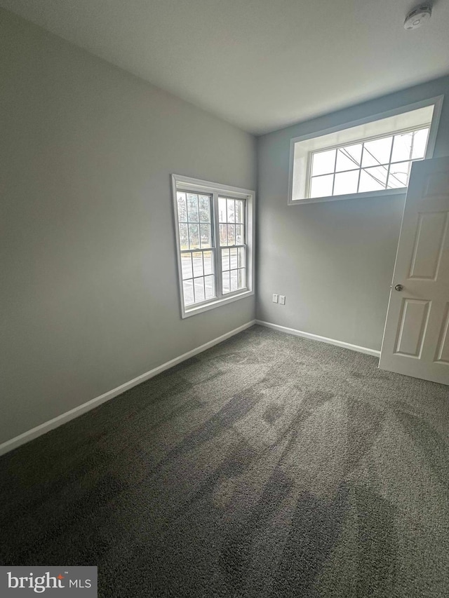 empty room with carpet floors