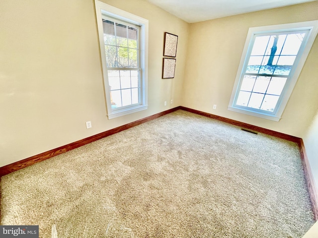 view of carpeted spare room