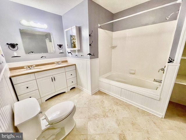 full bathroom with vanity, tub / shower combination, tile patterned floors, and toilet