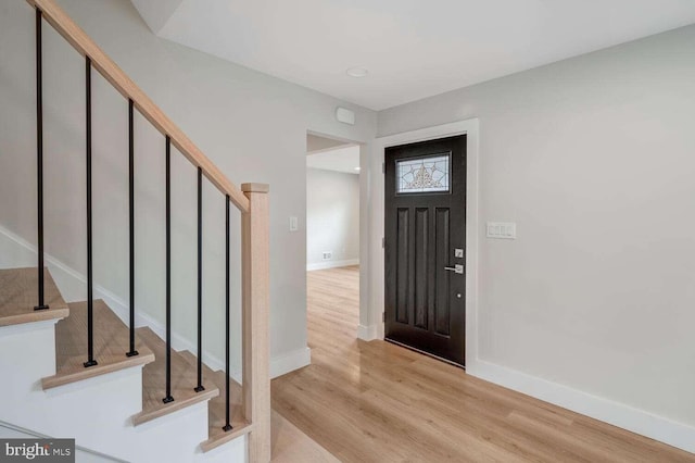 foyer entrance featuring light wood-type flooring