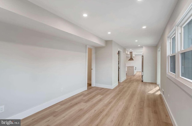 unfurnished living room featuring light hardwood / wood-style flooring