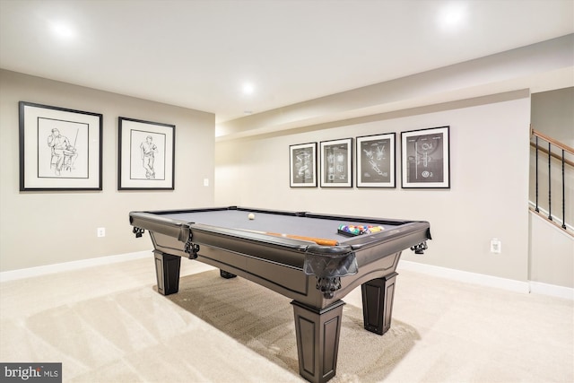 recreation room with light colored carpet and pool table