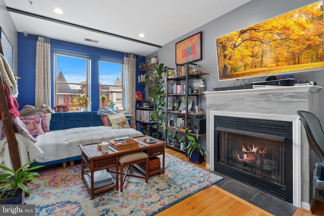 living room with dark hardwood / wood-style floors