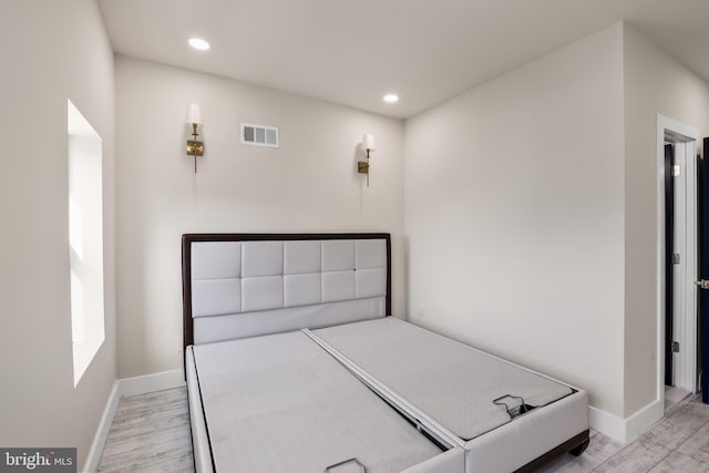 bedroom featuring light wood-type flooring