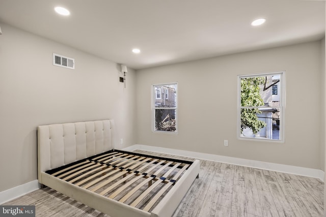 bedroom featuring light hardwood / wood-style floors