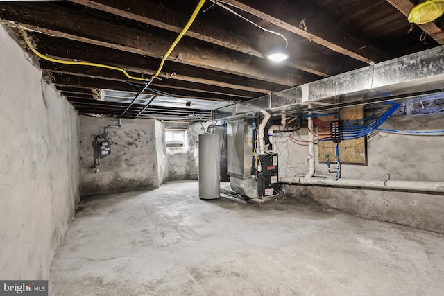 basement with gas water heater and heating unit