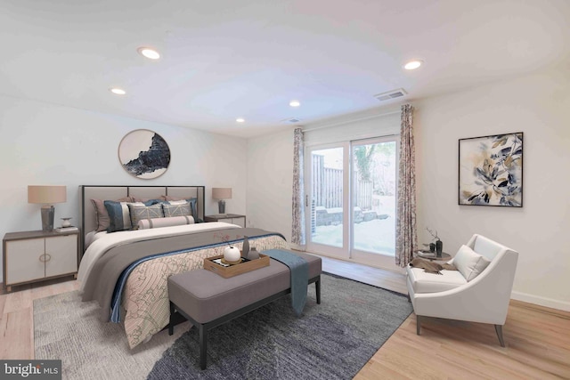 bedroom with access to outside, recessed lighting, light wood-style floors, and visible vents