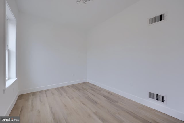 empty room featuring light hardwood / wood-style floors