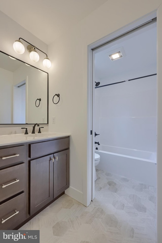 full bathroom featuring vanity, shower / bathtub combination, and toilet