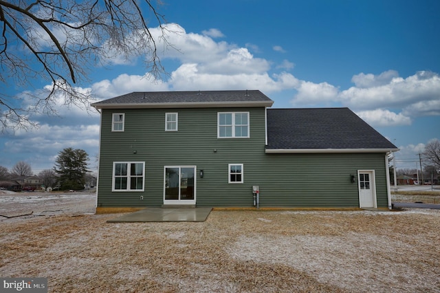 rear view of house featuring a patio