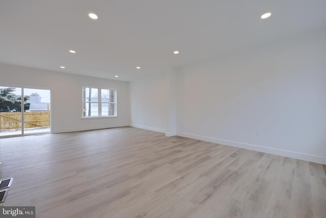 empty room with light wood-type flooring