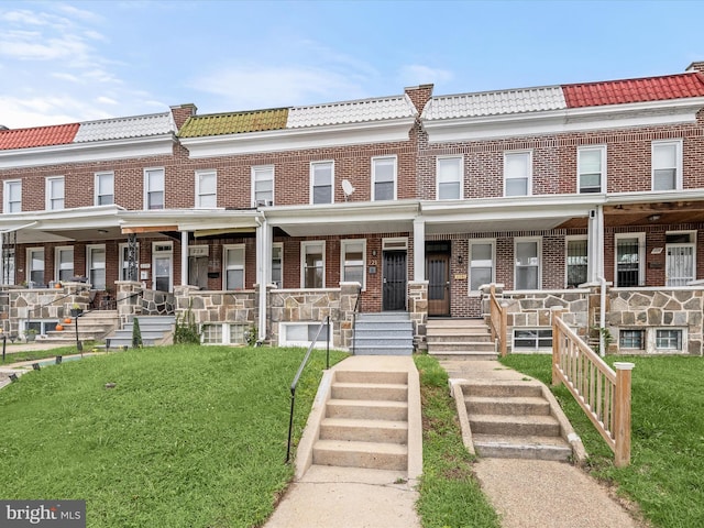 view of property with a front lawn