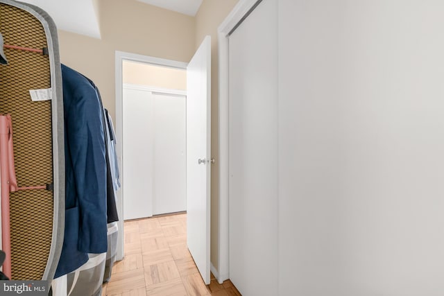 hall featuring light parquet flooring