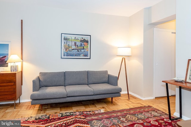 living room with light parquet floors