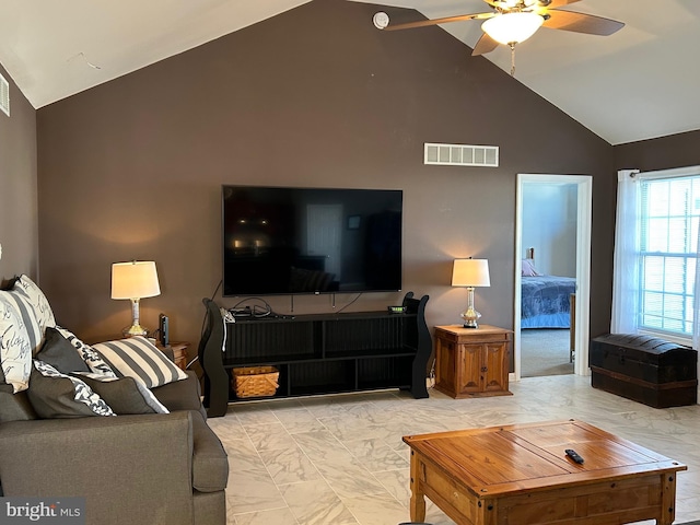 living room featuring lofted ceiling and ceiling fan