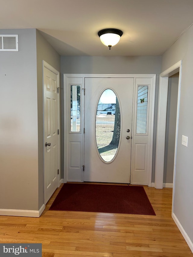 foyer featuring light wood-type flooring