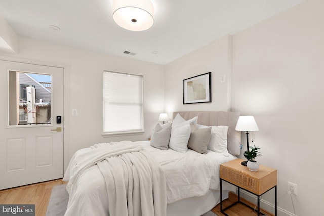 bedroom with light wood-type flooring