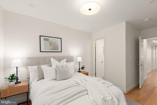 bedroom featuring hardwood / wood-style flooring