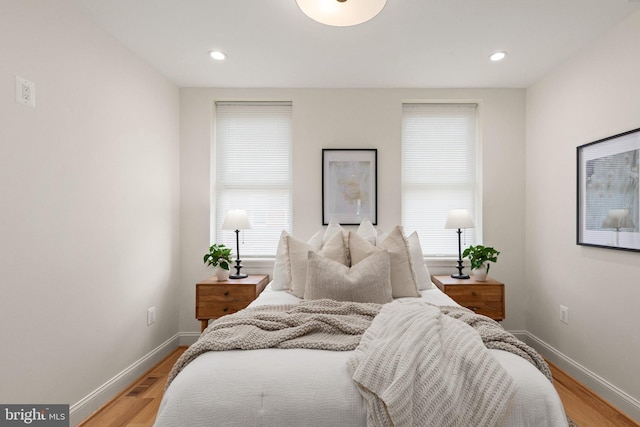 bedroom with light wood-type flooring