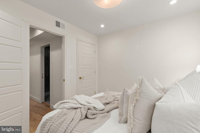 bedroom with light wood-type flooring