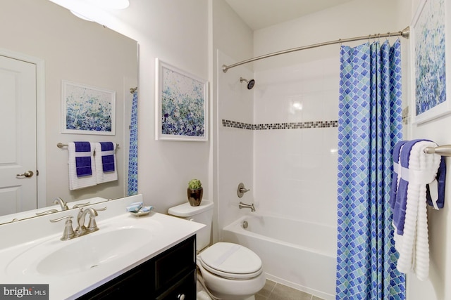 full bath featuring shower / bath combo, vanity, toilet, and tile patterned floors