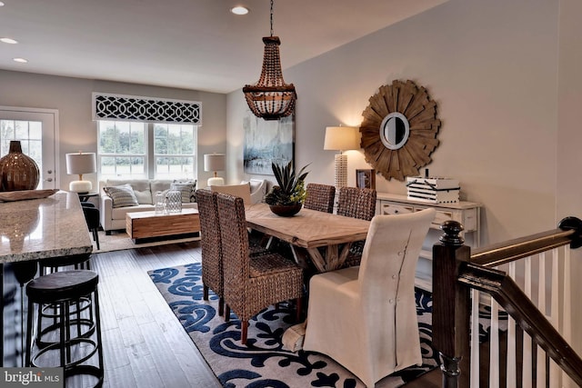 dining space featuring dark wood finished floors and recessed lighting