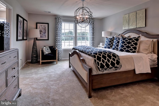 bedroom featuring visible vents, light carpet, baseboards, and an inviting chandelier