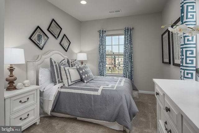 bedroom with recessed lighting, baseboards, visible vents, and carpet flooring