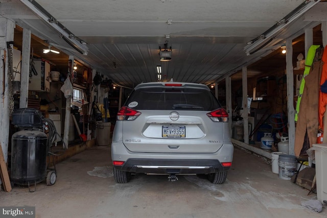 garage featuring a garage door opener