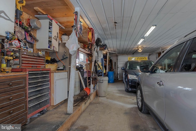 garage with a workshop area