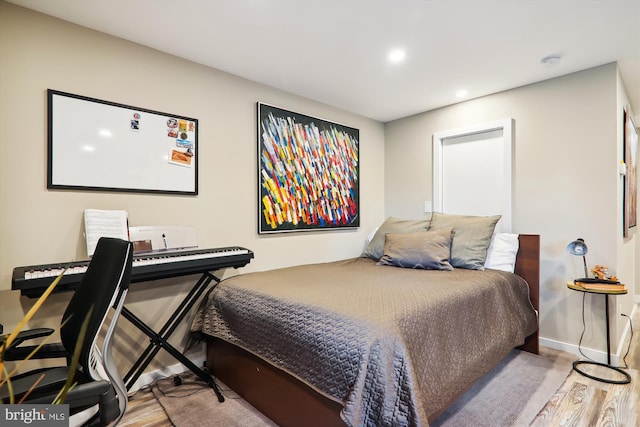 bedroom featuring light hardwood / wood-style flooring