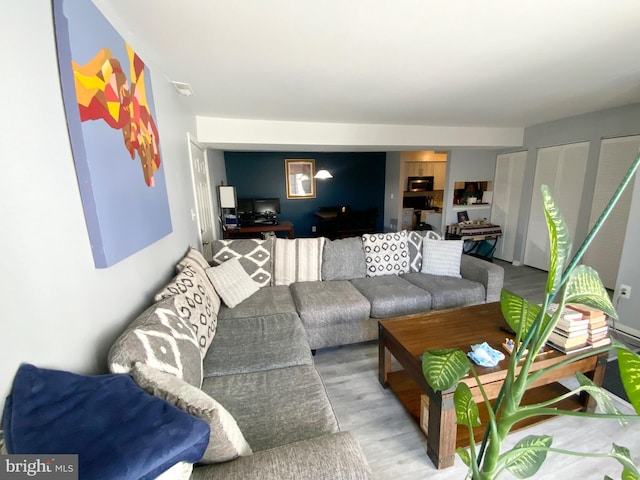 living room with hardwood / wood-style flooring