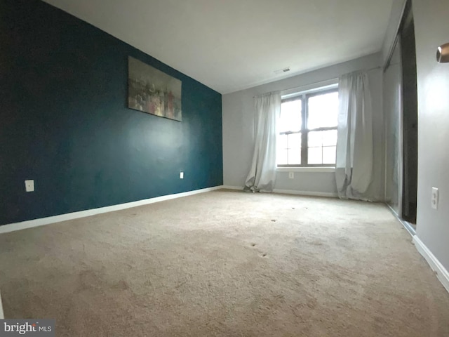 view of carpeted spare room