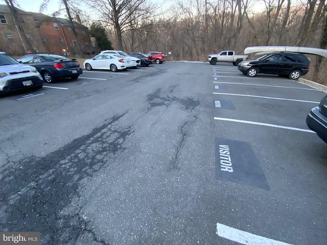 view of parking at dusk