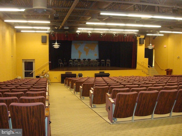 cinema room featuring carpet