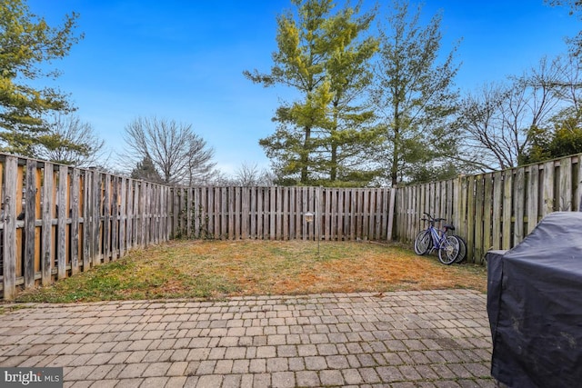 view of patio featuring a fenced backyard