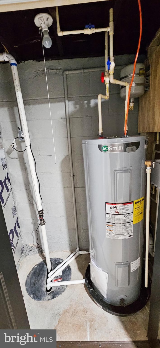 utility room with electric water heater