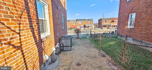 view of yard featuring central AC unit