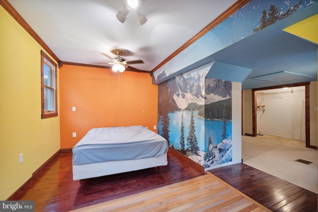 bedroom featuring crown molding, ceiling fan, and hardwood / wood-style floors