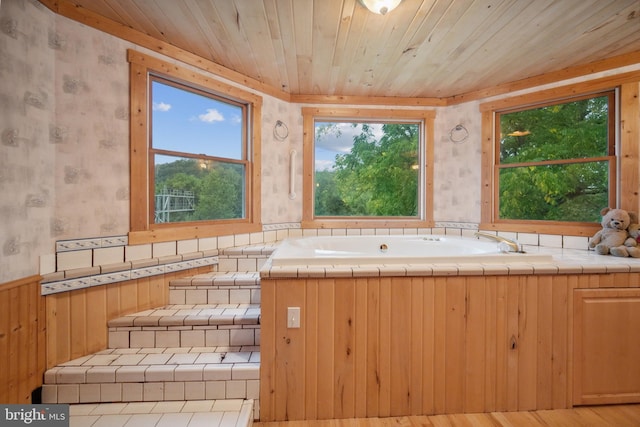 bathroom featuring hardwood / wood-style floors and wood ceiling