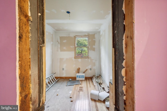 miscellaneous room featuring hardwood / wood-style flooring