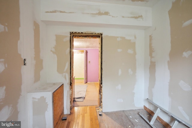 unfurnished room featuring wood-type flooring