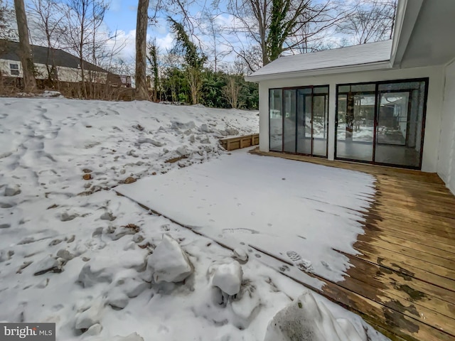 view of yard layered in snow