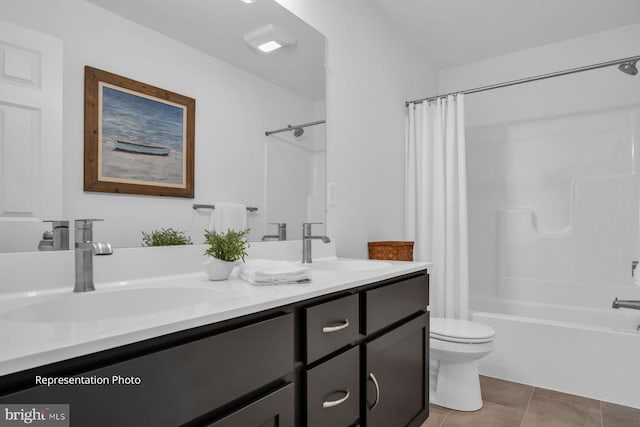 full bathroom with vanity, shower / tub combo, tile patterned floors, and toilet