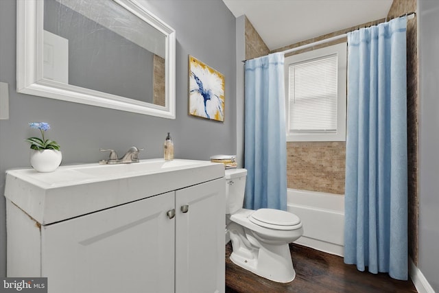 full bathroom featuring shower / tub combo with curtain, vanity, wood-type flooring, and toilet