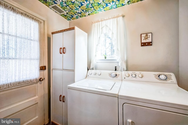 laundry room featuring washer and dryer