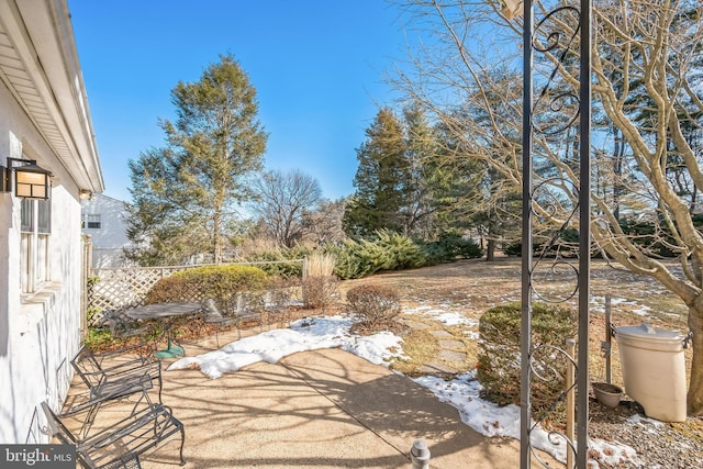 view of snow covered patio